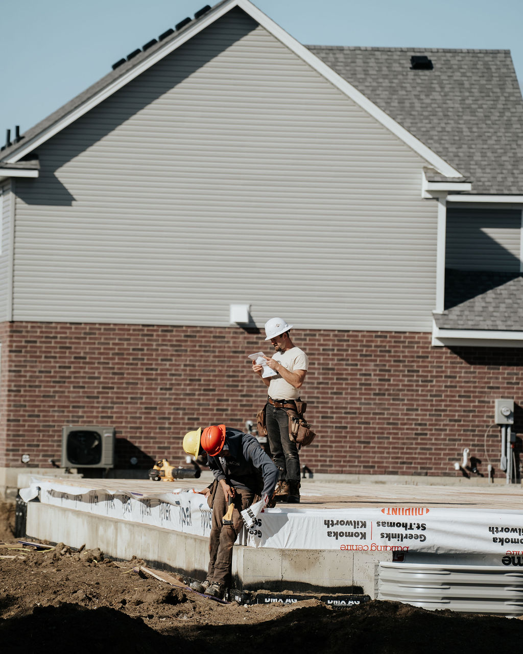 Crew working on residential framing at a jobsite